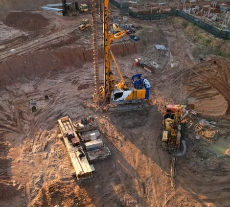 Geotechnical drilling rigs operating on a construction site during ground investigation works