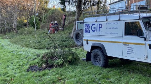 GIP geotechnical consulting van on site with drilling equipment in a rural location, Midlands